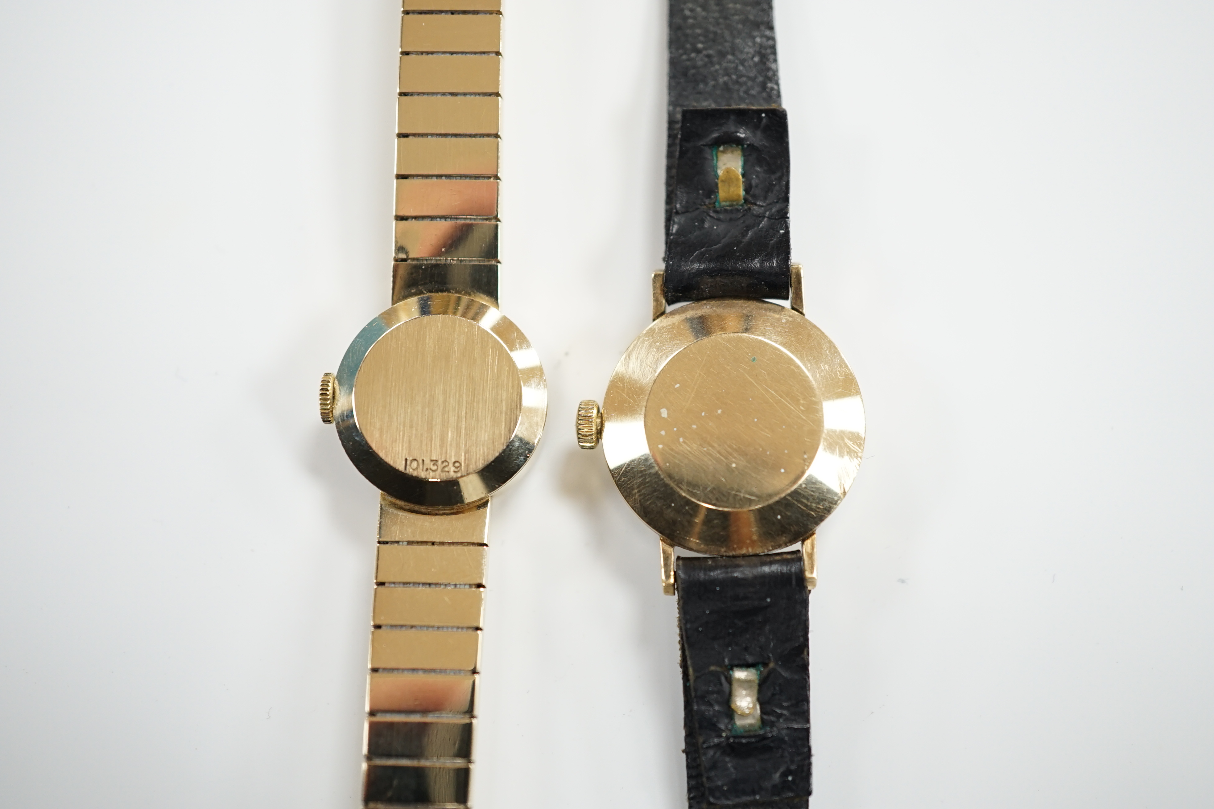 A lady's 9ct gold Eterna manual wind wrist watch, on a 9ct gold integral bracelet, overall 16.2cm, gross weight 23.7 grams, together with a lady's 9ct gold Rotary manual wind wrist watch, on a leather strap.